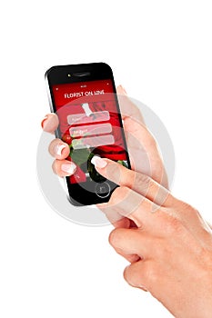 Hand holding mobile phone with florist offer on screen