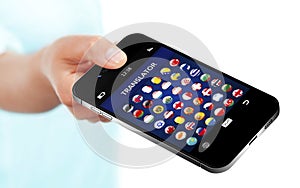 Hand holding mobile phone with language translator application o