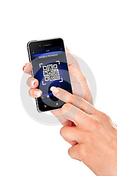 Hand holding mobile phone with qr code screen isolated over whit