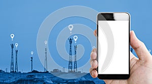 Hand holding mobile phone white screen, telecommunication towers and location icons sign background