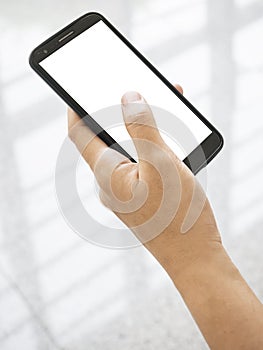 Hand holding Mobile Smart phone with blank screen