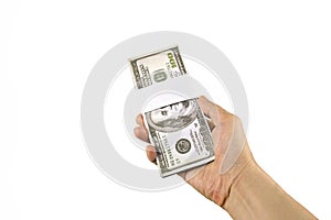 Hand holding money dollar isolated on white background.