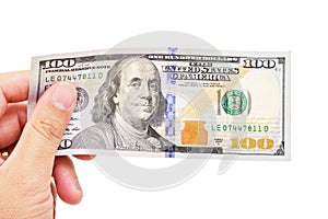 Hand holding money dollars banknote.
