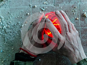 Hand Holding a mysterious glowing ball. art photo