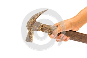 Hand holding old hammer