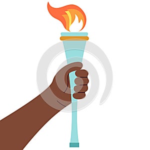 Hand holding Olympic torch with fire
