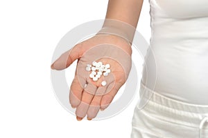Hand holding on open palm painkiller pill tablets medicine
