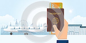 Hand holding passport book