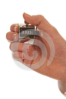 Hand holding a pedometer closeup