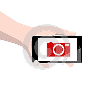 Hand Holding Phone with Camera Icon on Screen