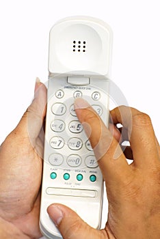 Hand holding a phone make emergency call.