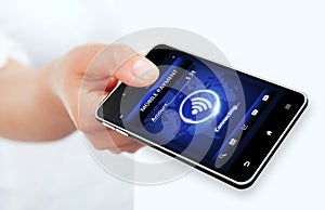 Hand holding phone with mobile payment connection