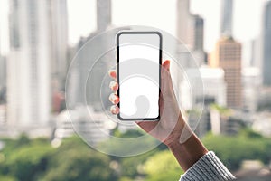 Hand holding phone mobile white blank screen