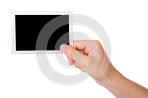 Hand holding a photograph