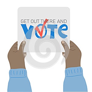 Hand holding placard with Get out there and vote text