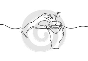 Hand holding plant`s pot. Continuous one line drawing of back to nature theme. Growing plant in hand palm. Concept of growing and