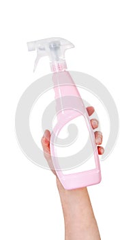 Hand holding plastic spray bottle with cleaning detergent isolated on white background