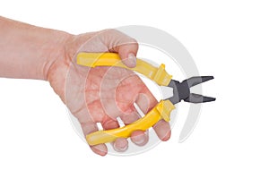 Hand Holding Plier With Yellow Grips