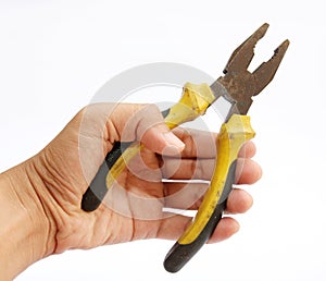 Hand holding a pliers