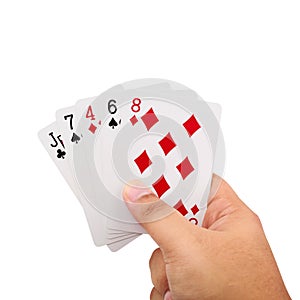 Hand holding a poker cards isolated on white background