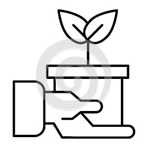 Hand holding pot with plant thin line icon. Sprout in pot vector illustration isolated on white. Flover pot in hand