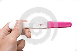 Hand holding pregnancy test showing a positive result isolate on white background, Abortion problem, Wellness and healthy concept