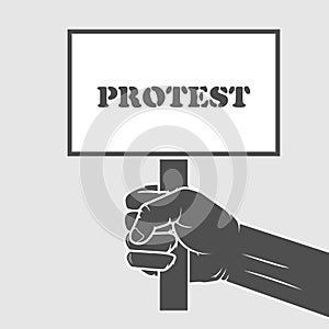 Hand holding protest poster - strike concept