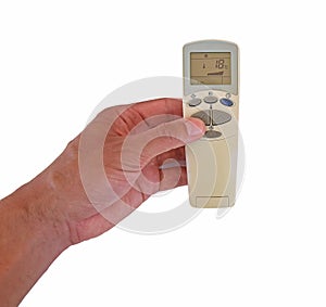 Hand holding a remote control for air conditioning