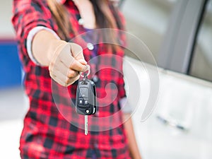 Hand holding the remote control car alarm systems