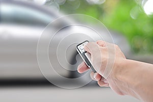 Hand holding remote control car