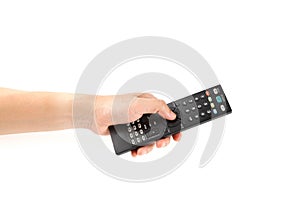 Hand holding a remote control isolated on a white background.