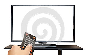 Hand holding remote control to the TV screen isolated on white background