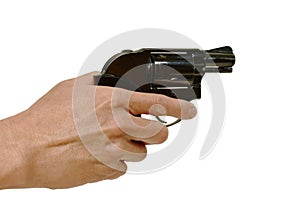 hand holding revolver gun and finger safety on trigger in white background