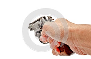 A hand holding a revolver gun pointing forward