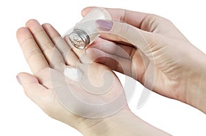 Hand holding a saltshaker