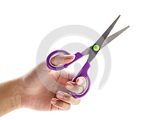 Hand holding a scissors