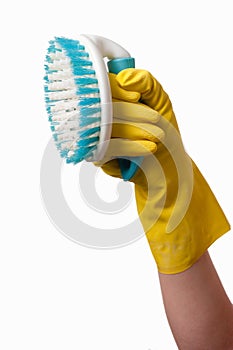 Hand holding scrub brush