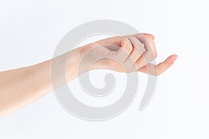 Hand holding seduction gesture in front of white background