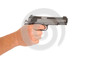 Hand holding semi-automatic pistol