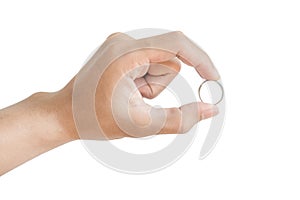 Hand holding silver ring, isolated on white background