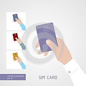 Hand holding SIM card.
