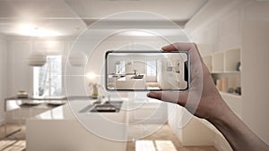 Hand holding smart phone, AR application, simulate furniture and interior design products in real home, architect designer concept photo