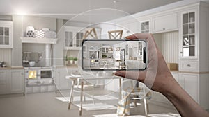 Hand holding smart phone, AR application, simulate furniture and interior design products in real home, architect designer concept