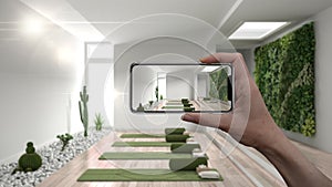 Hand holding smart phone, AR application, simulate furniture and interior design products in real space, architect concept, yoga
