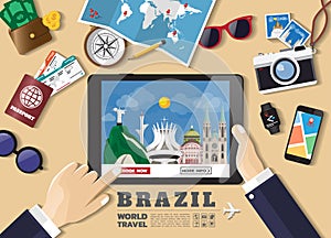 Hand holding smart tablet booking travel destination.Brazil famous places.Vector concept banners in flat style with the set of