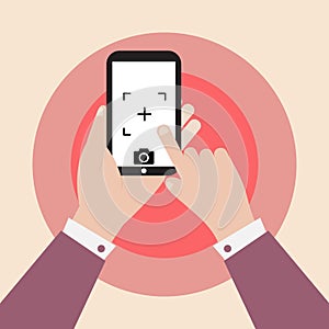 Hand holding smartphone with camera icon vector design
