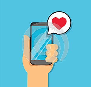 Hand holding smartphone with heart bubble chat