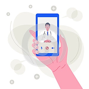 Hand holding smartphone with male doctor on screen.
