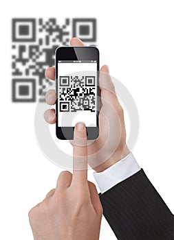 Hand Holding a Smartphone scanning qrcode