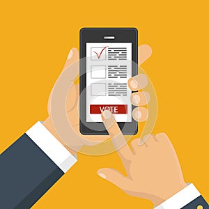 Hand holding smartphone with voting app on the screen. photo
